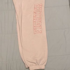 Light pink “fighter” sweats